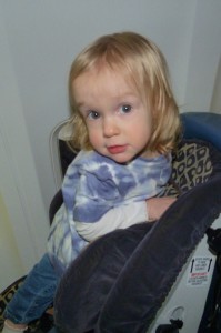 Elena was not a fan of remaining in her carseat throughout the flight.